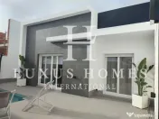 O vilă cu piscină, terasă pe acoperiș, la câțiva pași de toate facilitățile