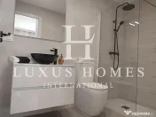 O vilă cu piscină, terasă pe acoperiș, la câțiva pași de toate facilitățile