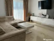 Apartament cu 3 camere în suprafață de 110 și un teren d 