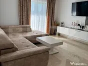 Apartament cu 3 camere în suprafață de 110 și un teren d 