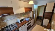 Apartament 3 camere zona Judetean mobilat-utilat 400 Euro 