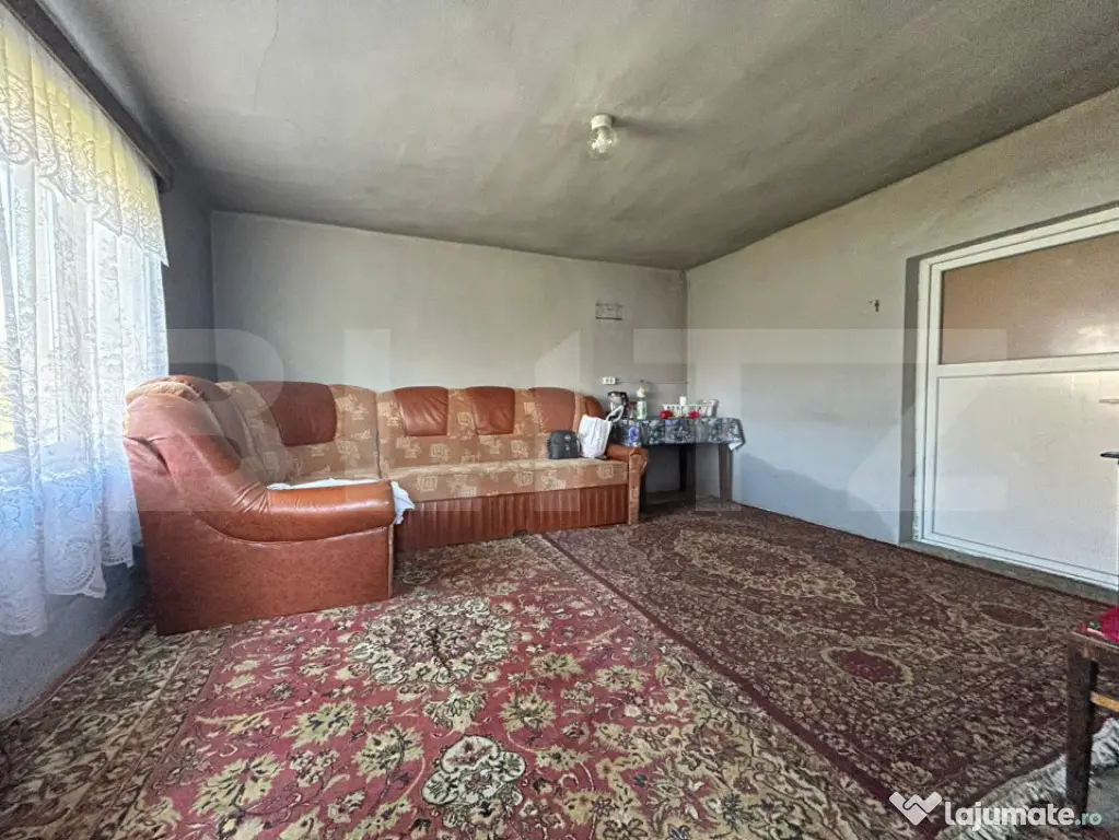 Casă cu teren generos de 1100 mp în Comuna Mică – ideal