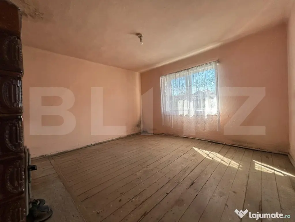 Casă cu teren generos de 1100 mp în Comuna Mică – ideal
