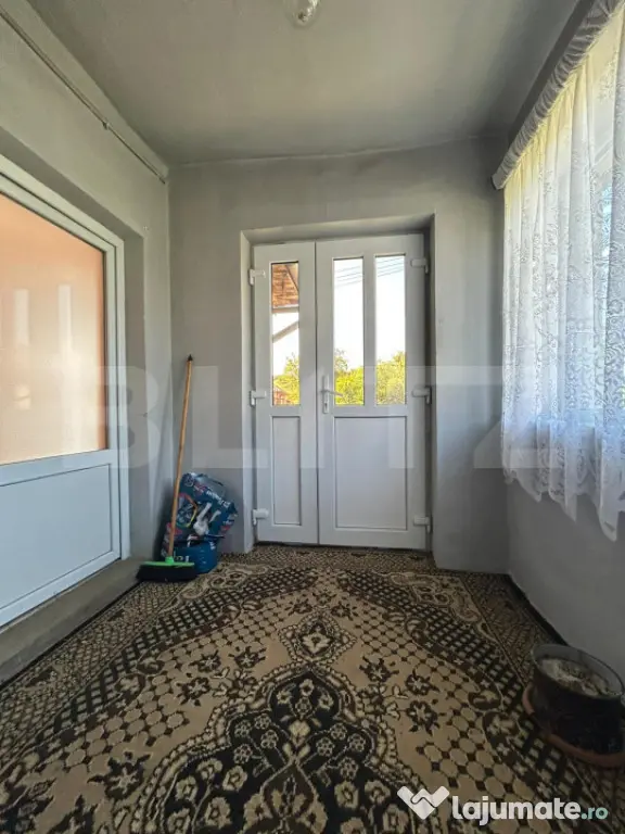 Casă cu teren generos de 1100 mp în Comuna Mică – ideal