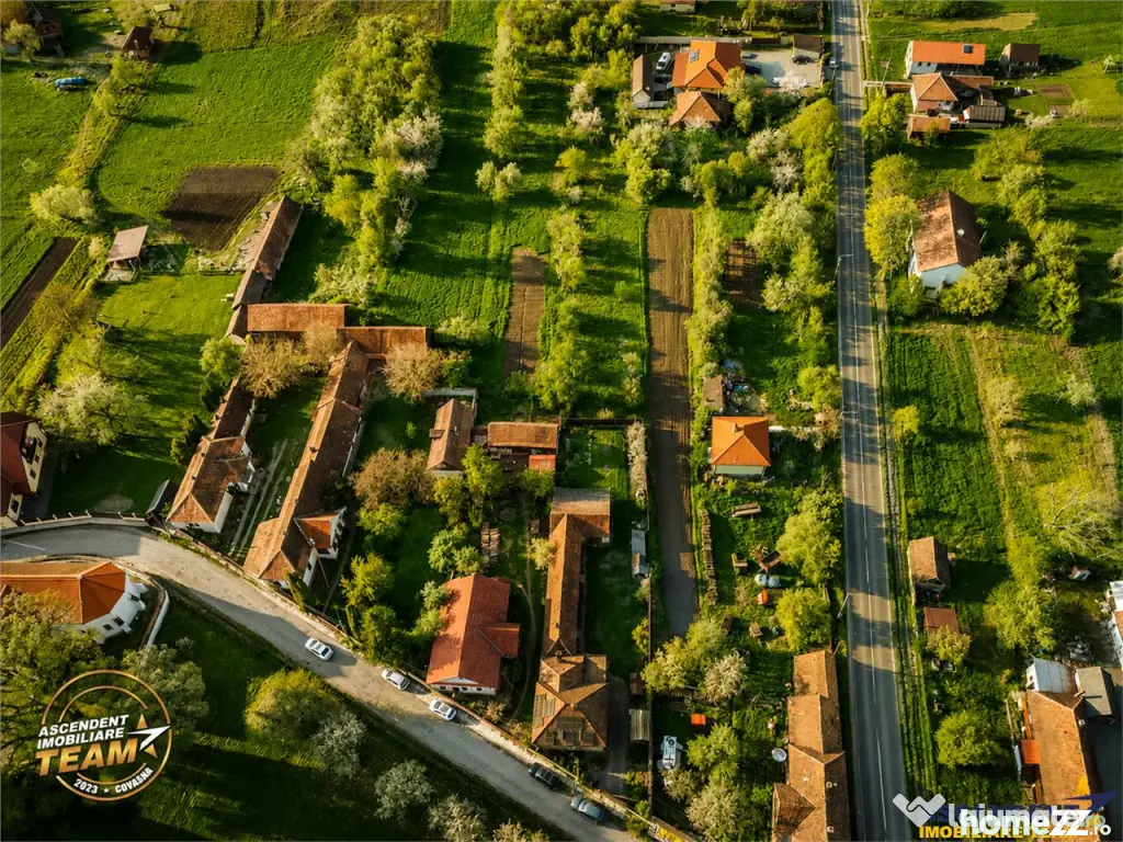 Casa familiala cu: teren 2.822 mp intravilan, sauna, atelie