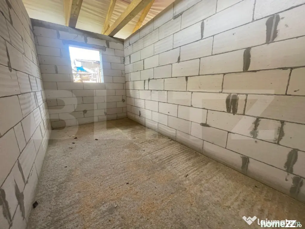 Casă pe un singur nivel, teren de 1.350 mp cu livadă, la d
