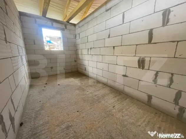 Casă pe un singur nivel, teren de 1.350 mp cu livadă, la d