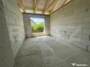 Casă pe un singur nivel, teren generos de 1.350 mp cu livad
