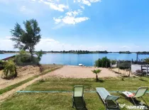 Teren pentru casă de vacanță cu plaja, 1150 mp, zona Apa