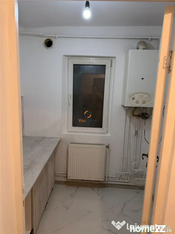 Apartament recent renovat cu centrala proprie parter zona Sa