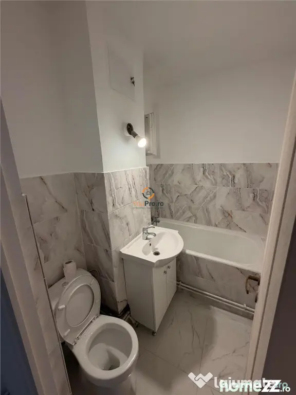 Apartament recent renovat cu centrala proprie parter zona Sa