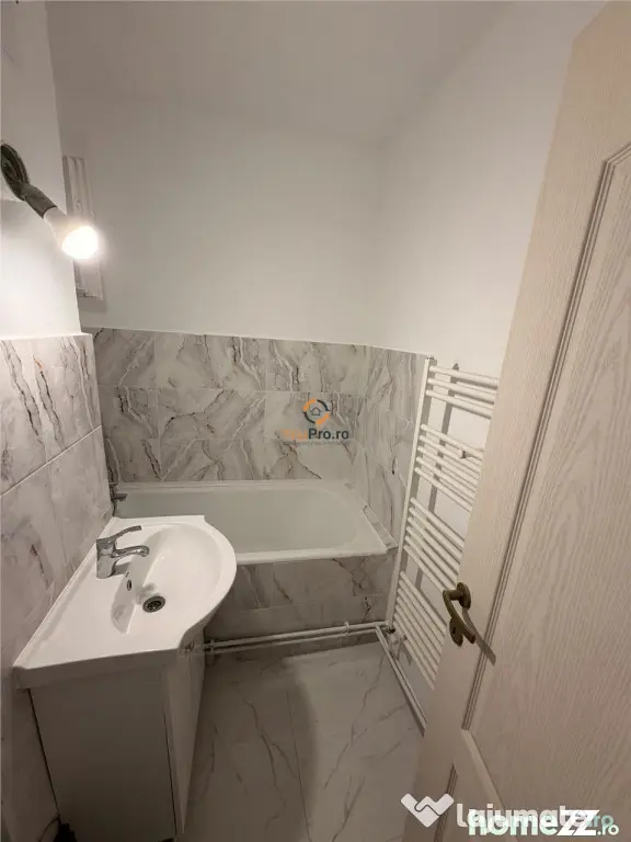 Apartament recent renovat cu centrala proprie parter zona Sa