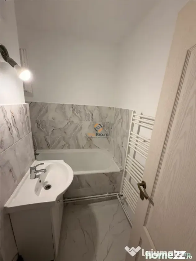 Apartament recent renovat cu centrala proprie parter zona Sa