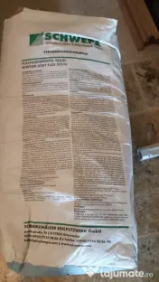Mortar/chit (alb) pentru rosturi caramida aparenta.