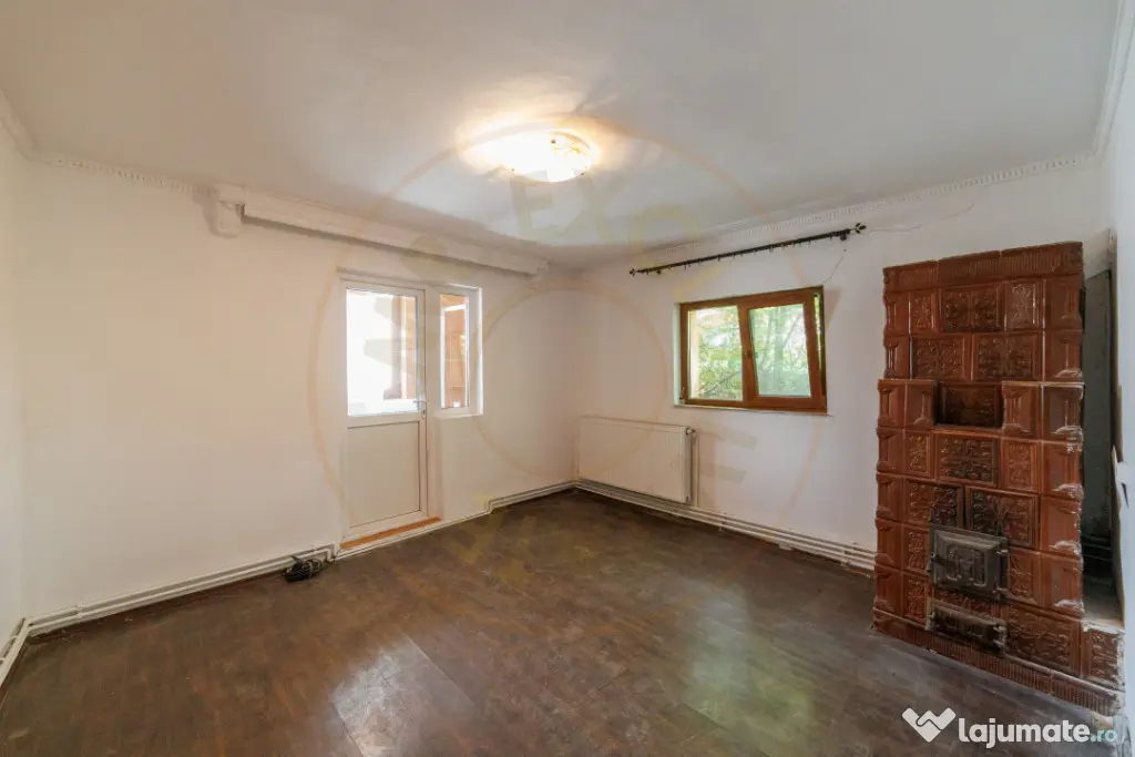Casa cu teren de 889mp Prundu - Ideala pentru locuit sau dez