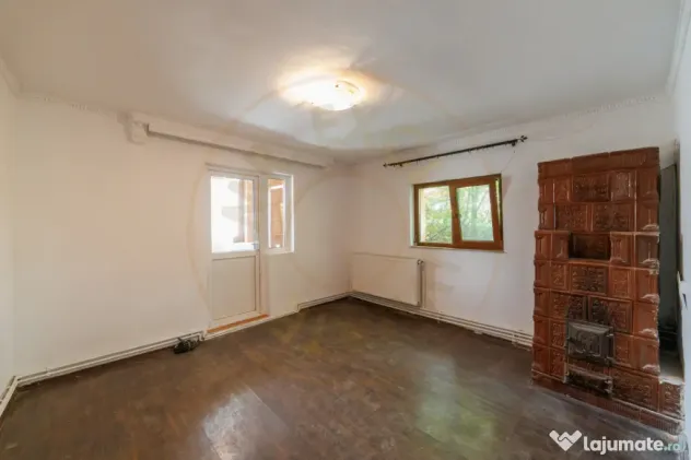 Casa cu teren de 889mp Prundu - Ideala pentru locuit sau dez
