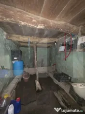 Casa taraneasca de lemn cu veranda 