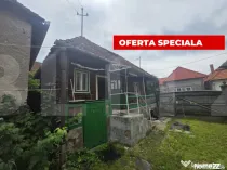 Casa taraneasca de lemn cu veranda