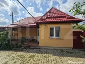 Casă cu două corpuri de clădire și grădină generoasă, 