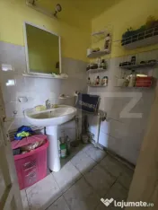 Casă cu două corpuri de clădire și grădină generoasă, 