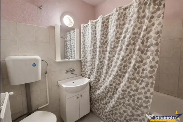 Nivel in casa cu 2 apartamente,145 mp utili teren 338mp, Gh