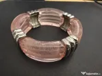Bratara cu elastic deosebita