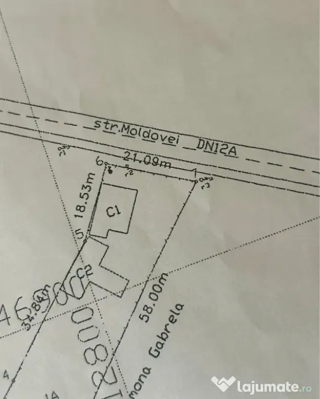 Casă din cărămidă cu teren intravilan 2.262 mp – Comănești
