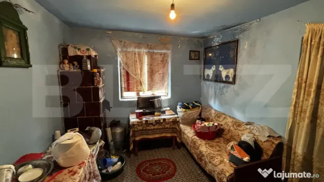 Casă bătrânească 62 mp construiți, 1.427 mp teren, comu