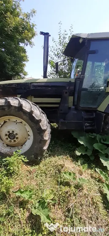 Tractor Hurlimman si plug 4 cormane reversibil