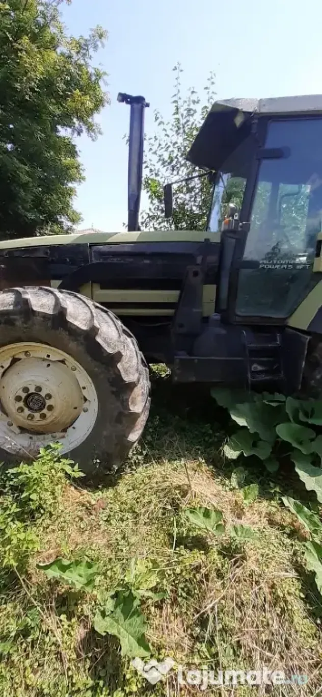 Tractor Hurlimman si plug 4 cormane reversibil