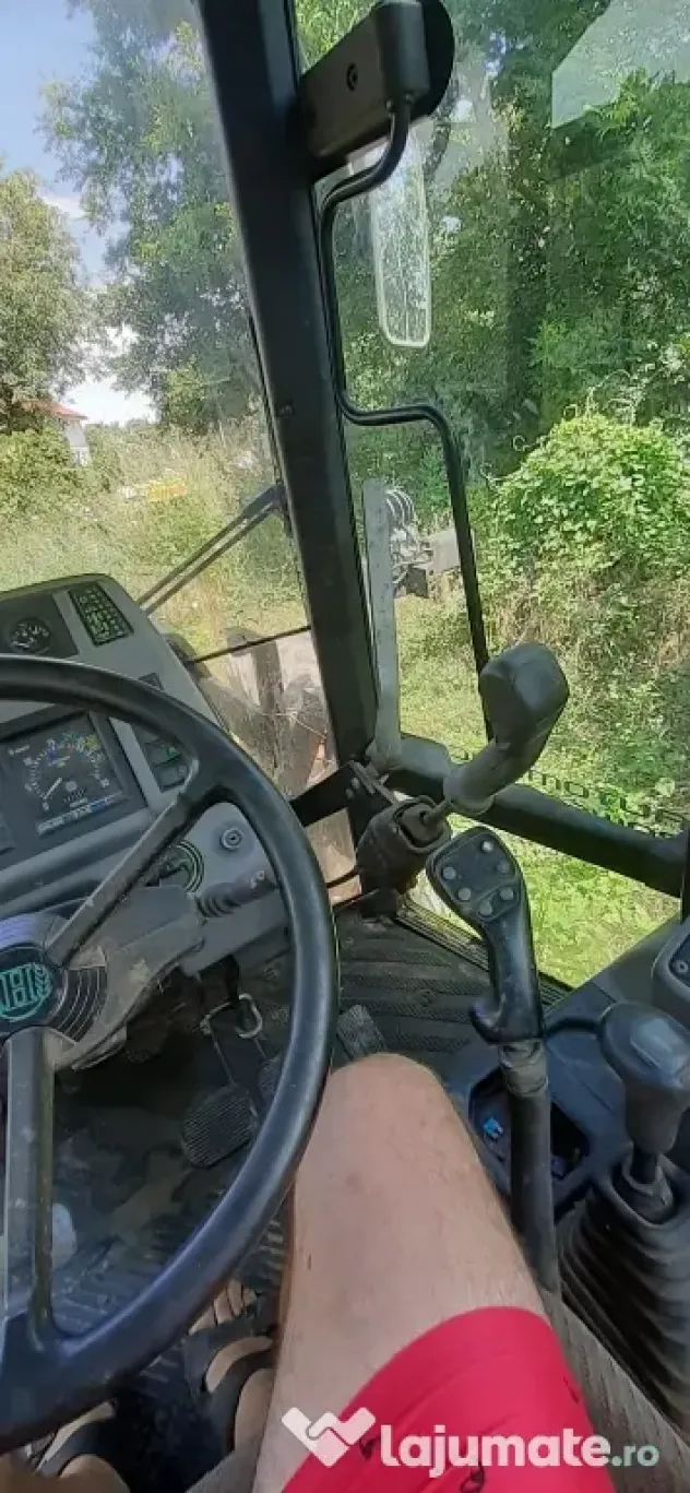 Tractor Hurlimman si plug 4 cormane reversibil