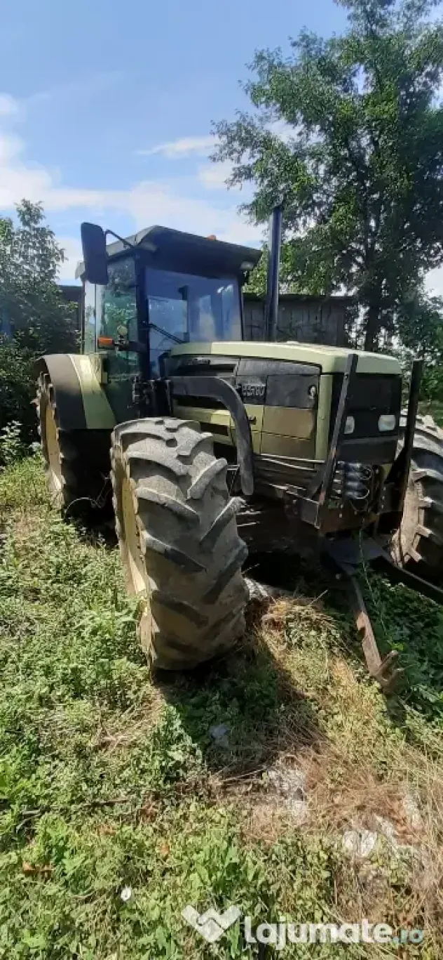 Tractor Hurlimman si plug 4 cormane reversibil