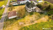 Casa 300mp, teren 1900 mp intravilan, 6 dormitoare, 2 garaje