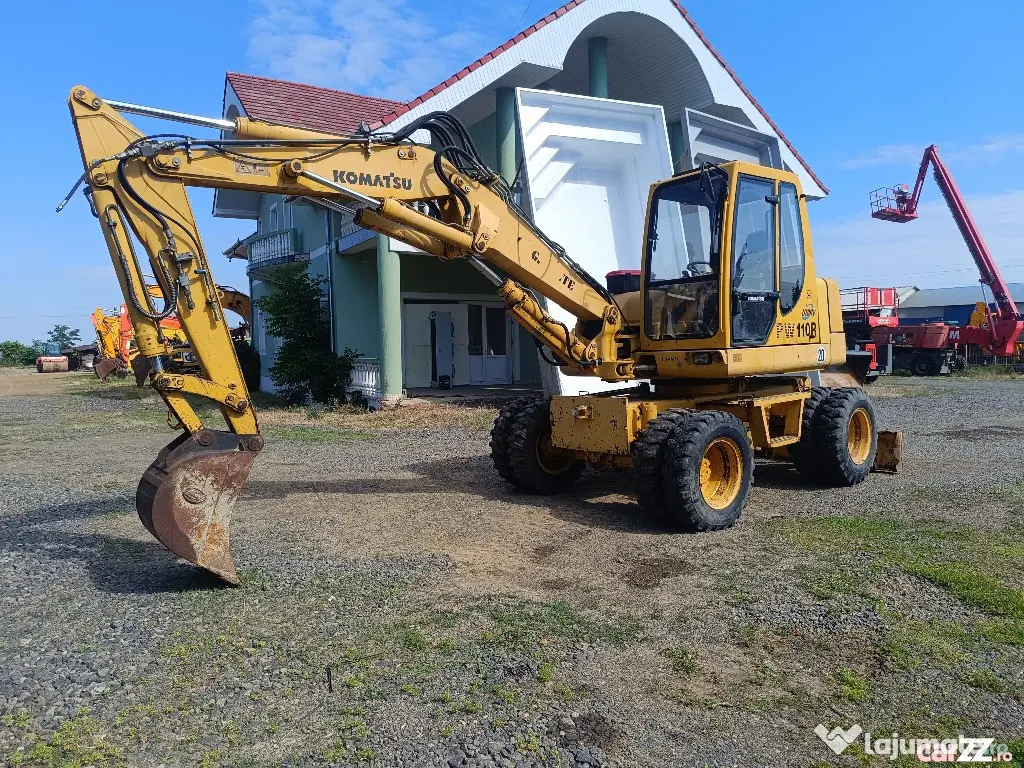 Excavator pe roți Komatsu PW110R, 12 Tone, 2010 - Negresti Oas (Satu-Mare)