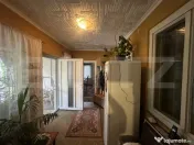 Casă 202 mp cu teren 1.178 mp, livadă și garaj – Petin 