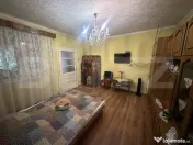 Casă 202 mp cu teren 1.178 mp, livadă și garaj – Petin 
