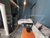 Casă cocheta cu terasă privată și design industrial –