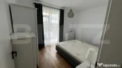 Apartament modern cu grădină proprie de 140 mp și parcare 