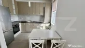 Apartament modern cu grădină proprie de 140 mp și parcare 