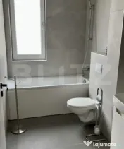 Apartament modern cu grădină proprie de 140 mp și parcare 