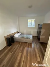 Apartament la casa de inchiriat cu loc de parcare, teren 500