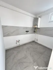 Garsoniera spatioas-Renovata integral-Potrivită pentru locu 