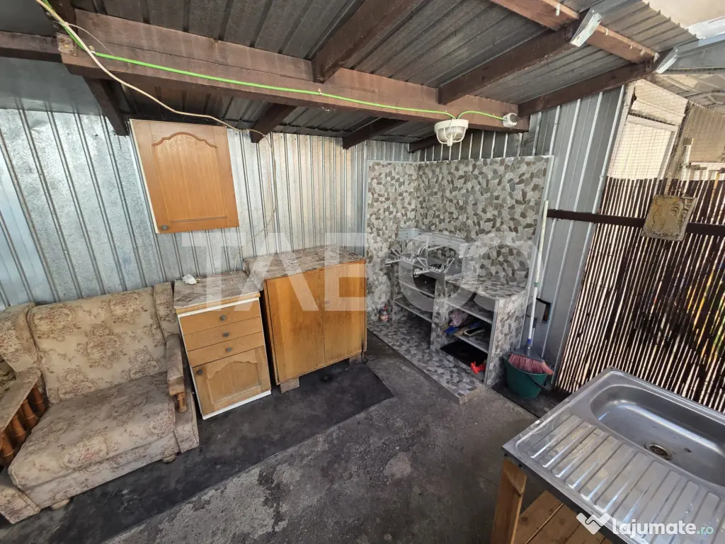 Casa 2 camere curte comuna de vanzare zona Centrala 47 mp ut - Fagaras (Brasov)