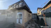 Casa cu 2 camere si mansarda ,plus bucatarie de vara .