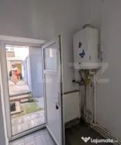 Casa cu 2 camere si mansarda ,plus bucatarie de vara .