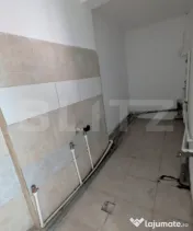 Casa cu 2 camere si mansarda ,plus bucatarie de vara .