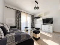 Apartament cu 2 camere, mobilat, cu parcare și centrală pr 