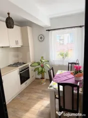 Apartament cu 2 camere, mobilat, cu parcare și centrală pr 