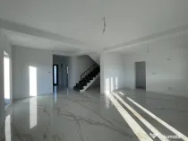 Duplex despartit prin camera tehnica finisaje premium Mosni