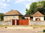 Casa cu teren de 1.315 mp, bucatarie de vara renovata, acces
